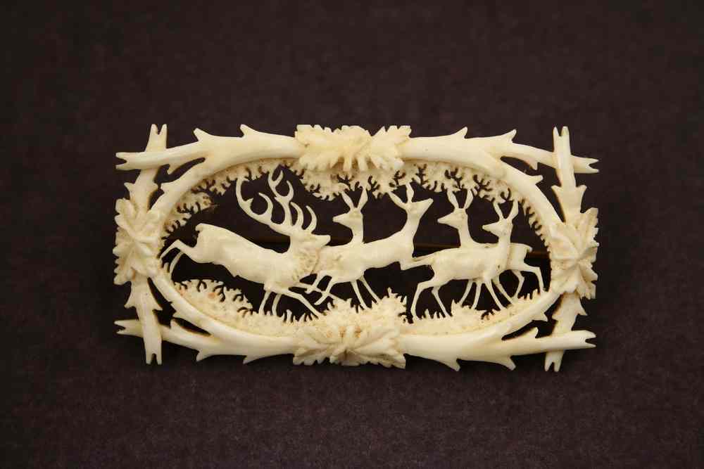 Appraisal: BROOCH - Circa carved ivory brooch depicting Stag with four