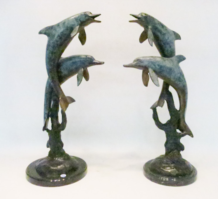 Appraisal: PAIR PATINATED BRONZE DOLPHIN SCULPTURES each depicting two dolphins leaping