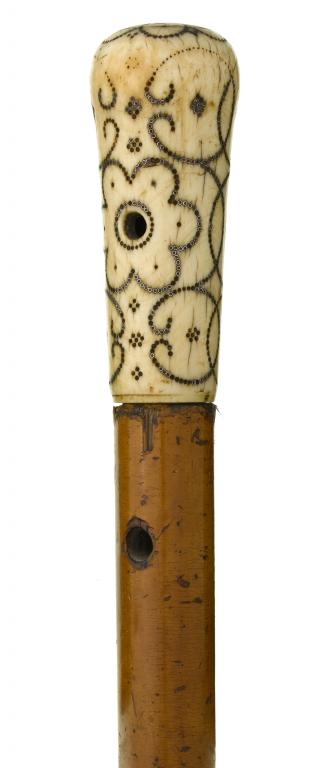 Appraisal: A WILLIAM III IVORY AND PIQU HANDLED CANE the flared