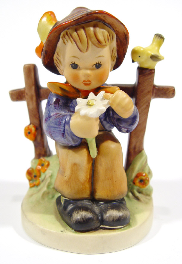 Appraisal: Goebels Hummel figure of a boy picking flower petals with