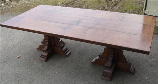 Appraisal: A Twentieth century oak refectory table on twin X shaped