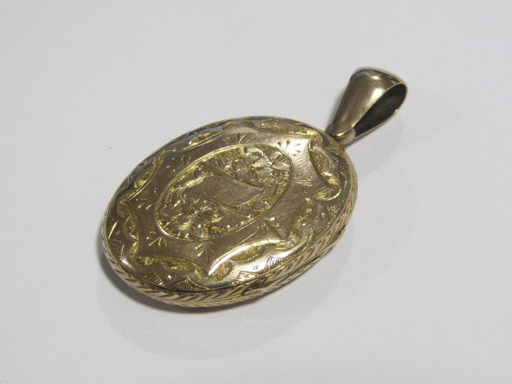 Appraisal: Victorian yellow metal engraved photo locket