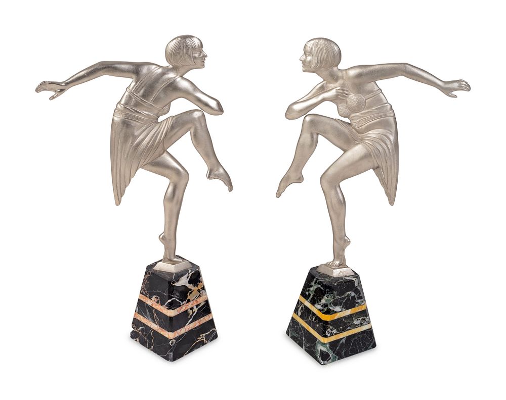 Appraisal: A Pair of Art Deco Silvered Metal Dancers on Marble