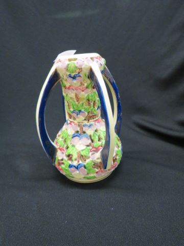 Appraisal: Hungarion Art Pottery Vase openwork floral handled