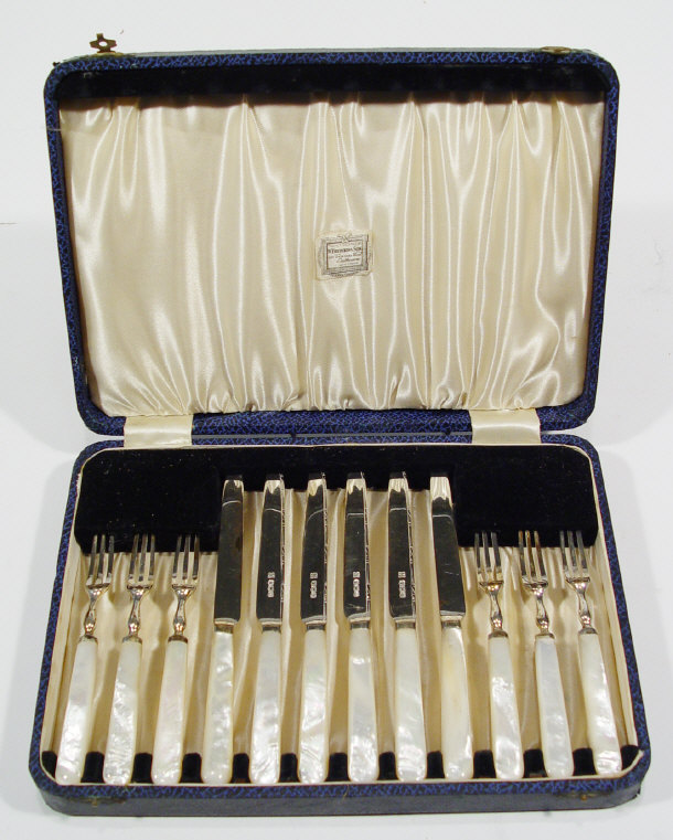 Appraisal: Set of six silver bladed fruit knives and forks with