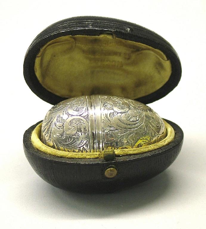 Appraisal: Victorian cased egg shaped box with foliate engraved decorations long