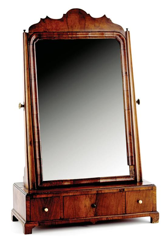 Appraisal: English mahogany dressing stand circa shaped and molded frame enclosing