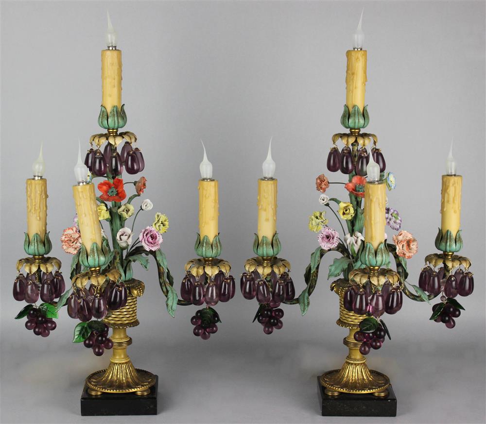 Appraisal: PAIR OF CONTINENTAL PORCELAIN MOUNTED POLYCHROMED METAL FOUR-LIGHT CANDELABRA with