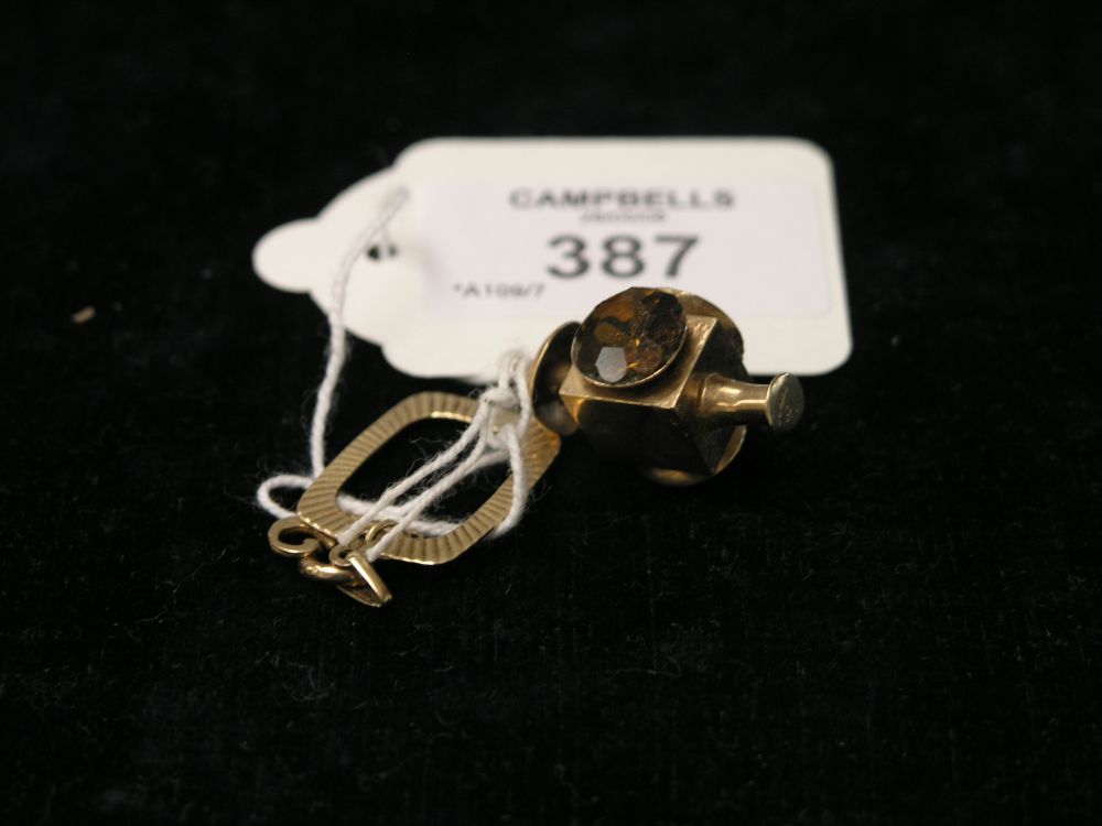 Appraisal: A ct gold pendant and a ct gold charm