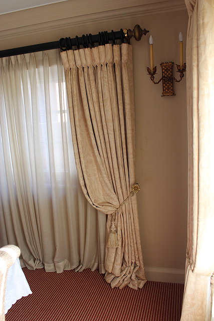 Appraisal: TWO PAIRS OF CREAM AND BEIGE INTERLINED CURTAINS scrolling leaf