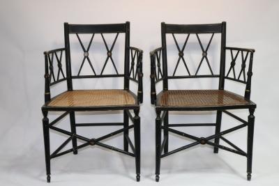 Appraisal: A pair of Regency ebonised cane seat armchairs with X