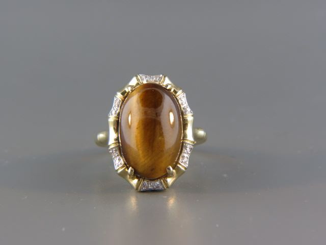 Appraisal: Tigerseye and Diamond Ring large oval cabachon k yellow gold