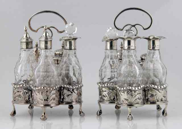 Appraisal: A pair of silver cruet stands Thomas Blake London of