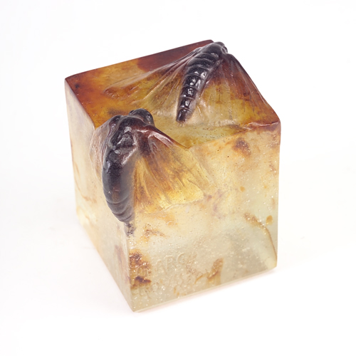 Appraisal: GABRIEL ARGY-ROUSSEAU Pate-de-cristal square amber mottled paperweight molded with two