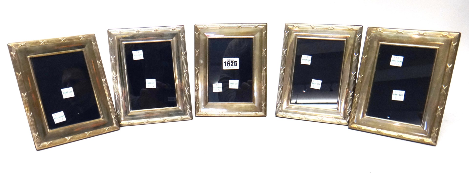 Appraisal: Five similar silver mounted rectangular photograph frames decorated with reeded