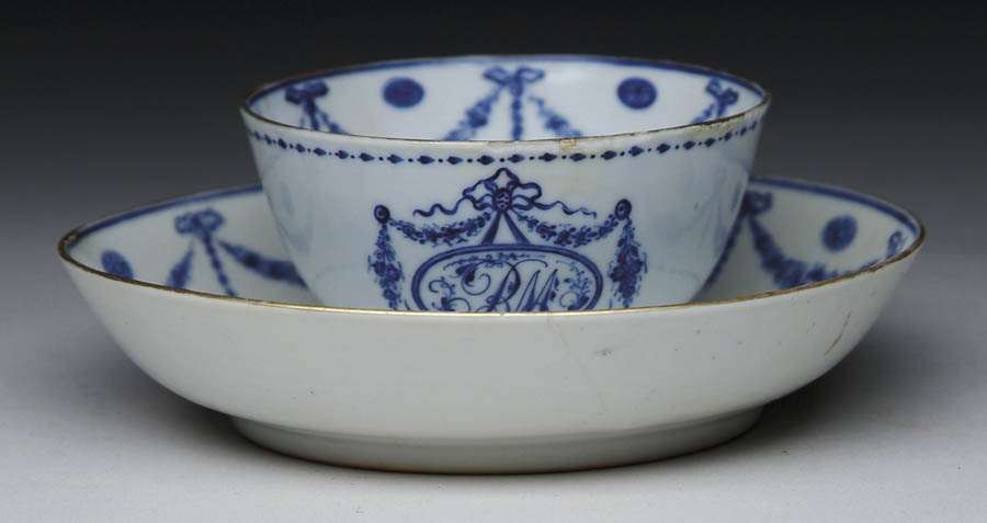 Appraisal: BLUE AND WHITE DECORATED ORIENTAL EXPORT CUP AND SAUCER The