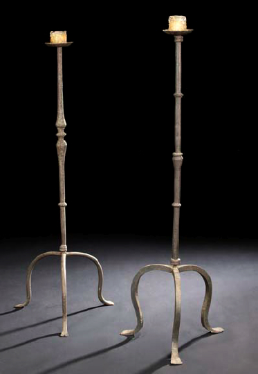 Appraisal: Spanish Baronial-Style Wrought-Iron Candle Stand th century with a candle