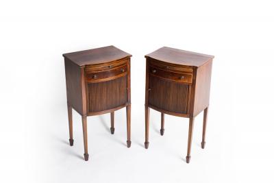 Appraisal: A pair of Georgian mahogany bowfront bedside tables fitted a