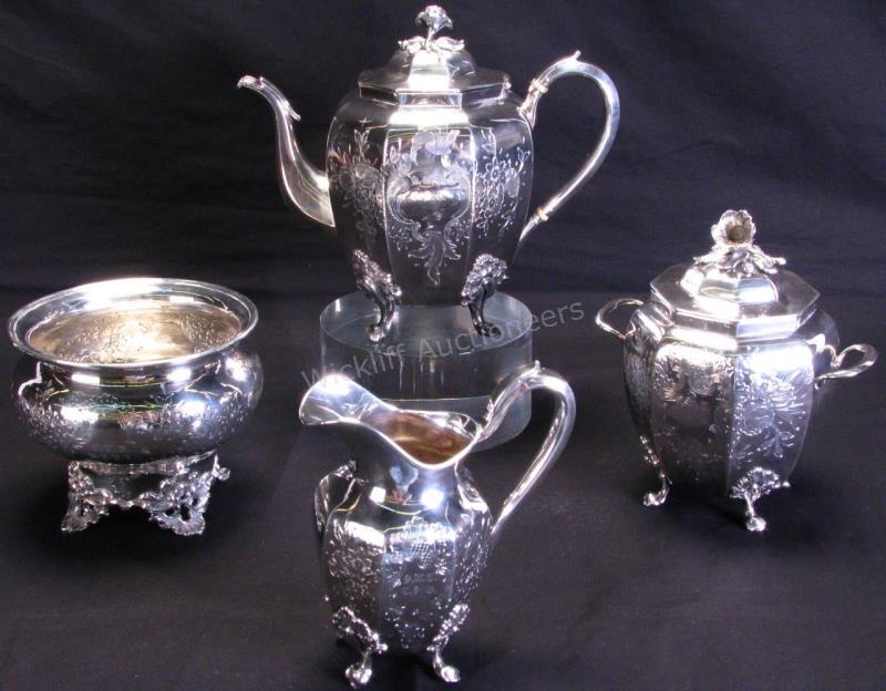 Appraisal: Mulford and Wendell Silverplate Tea Set teapot tall lidded biscuit