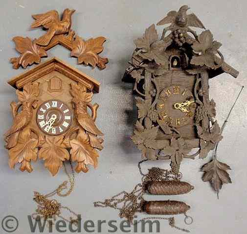 Appraisal: Two carved Black Forest cuckoo clocks one late th c