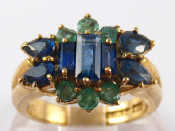 Appraisal: A carat gold emerald and sapphire ring size L gms