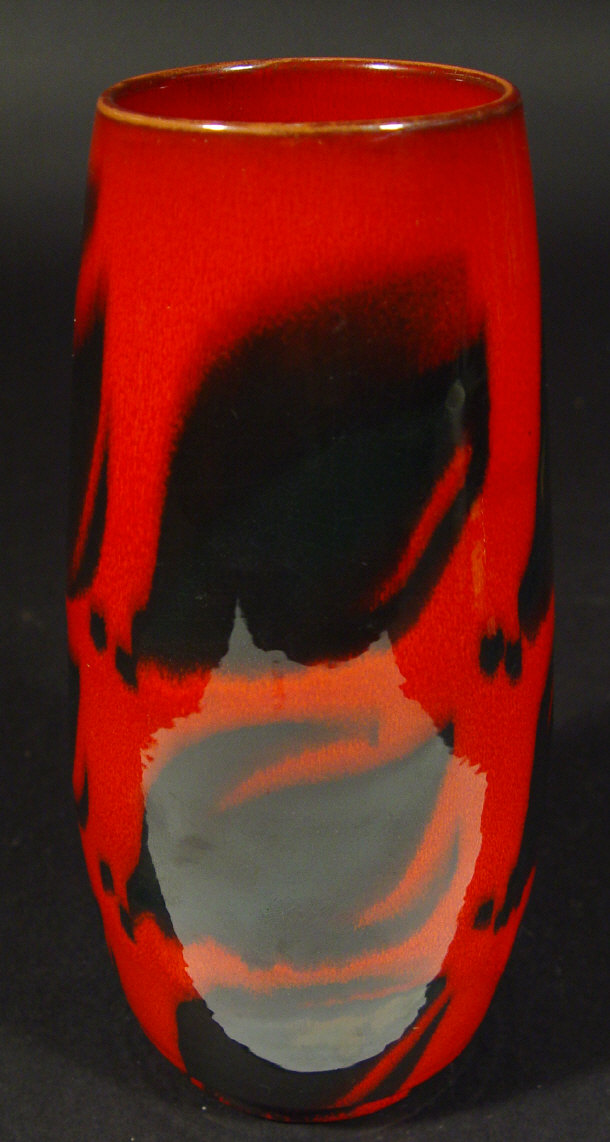 Appraisal: Poole Pottery red ground vase decorated with black stylised leaves