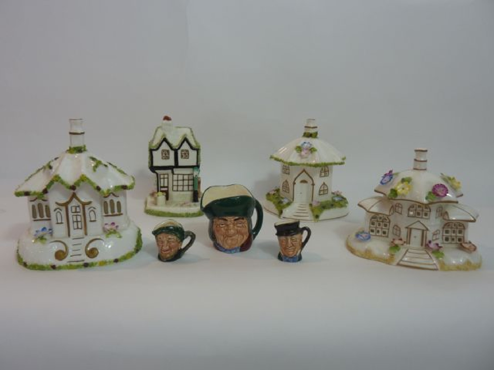 Appraisal: A collection of four Coalport model cottages the Gate House