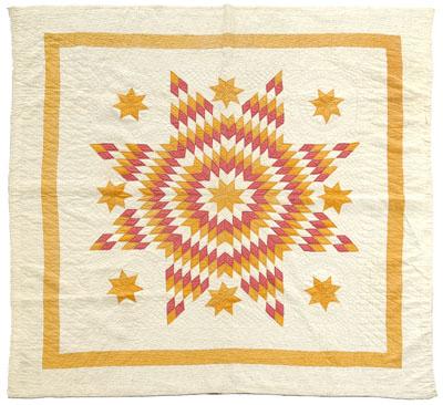 Appraisal: Star of Bethlehem pieced quilt hand stitched large central star