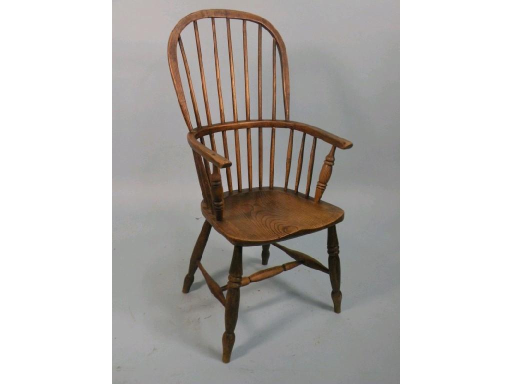 Appraisal: A mid thC ash and elm Windsor armchair with a