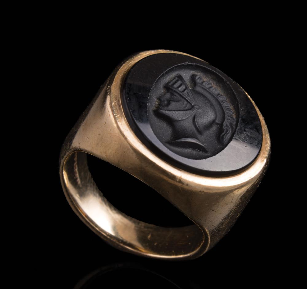 Appraisal: kt Yellow Gold and Onyx Intaglio Ring round onyx carved