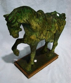 Appraisal: A bronze figure of a Chinese Horse on a bronze