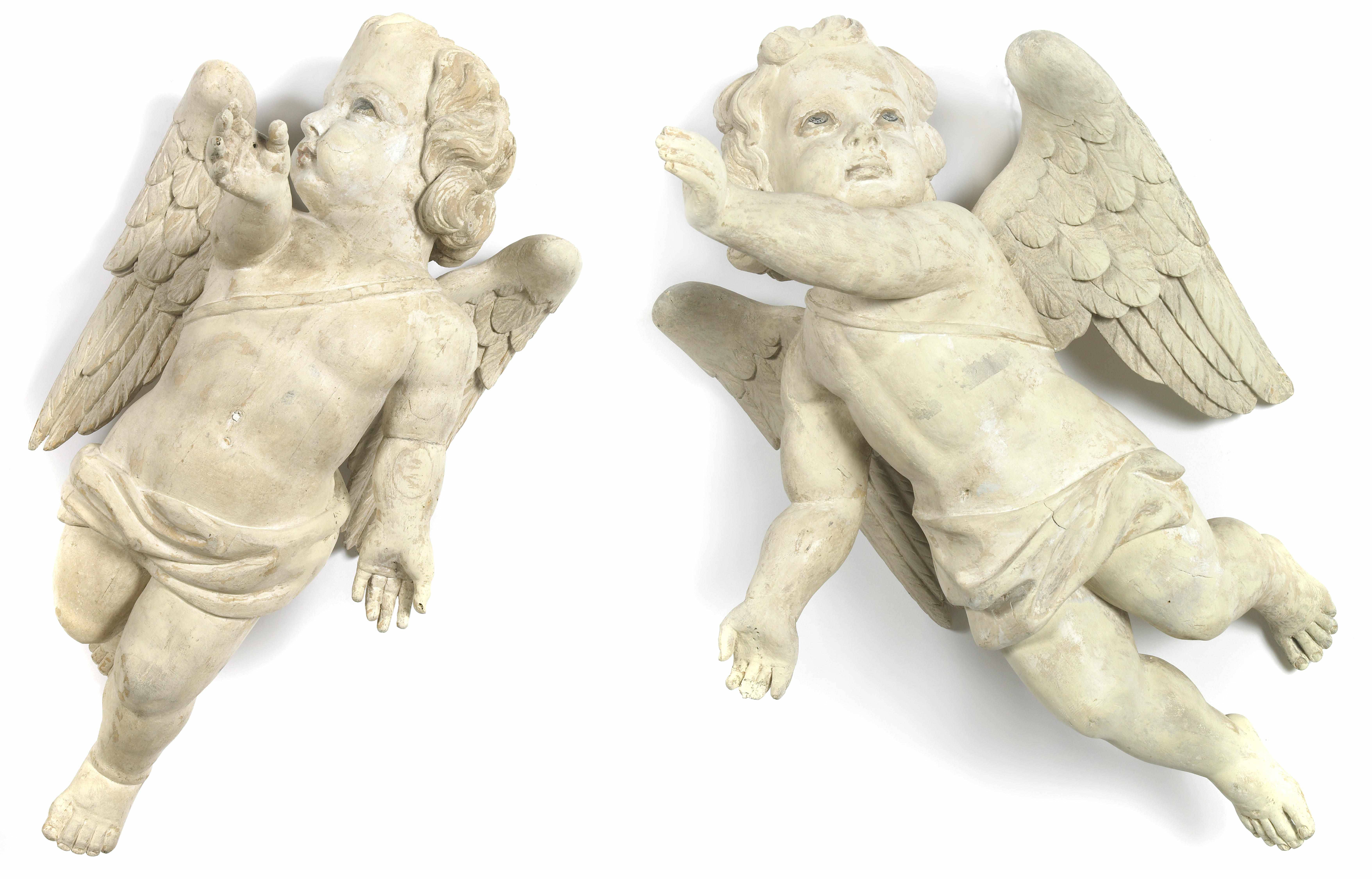 Appraisal: A pair of Italian Baroque style paint decorated wood cherubs