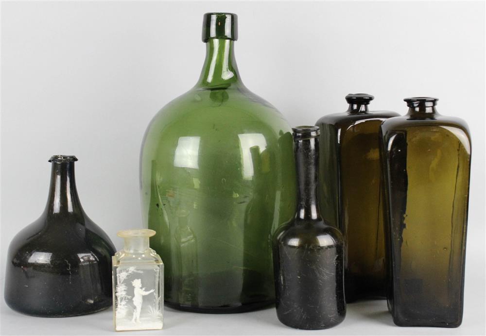 Appraisal: FIVE COLORED GLASS BOTTLES AND DECANTERS AND A SMALL CLEAR