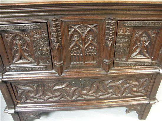 Appraisal: th century oak cabinet with two carved panelled doors above