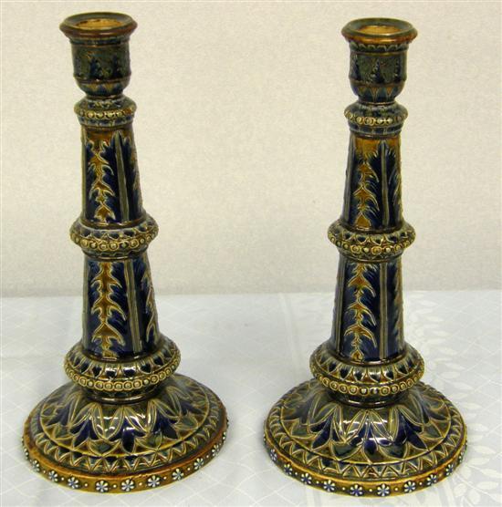 Appraisal: Pair of Doulton Lambeth stoneware candle-sticks both restored h in