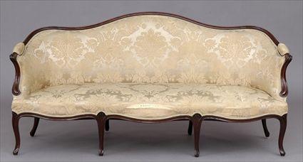 Appraisal: GEORGE III CARVED MAHOGANY SETTEE The serpentine-molded top rail continuing