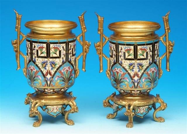 Appraisal: A PAIR OF FRENCH GILT METAL AND CHAMPLEVE VASES with