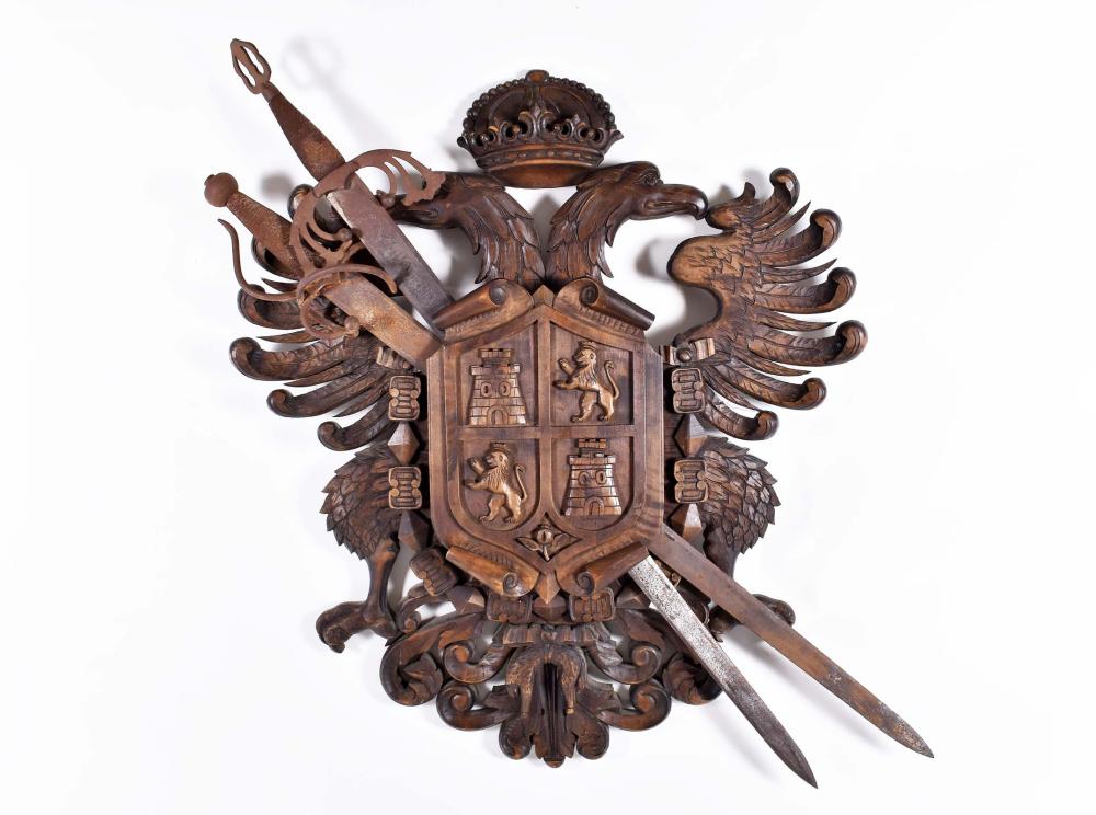 Appraisal: CONTINENTAL CARVED WOOD ARMORIAL DEVICEPossibly Spanish Carved as a shield