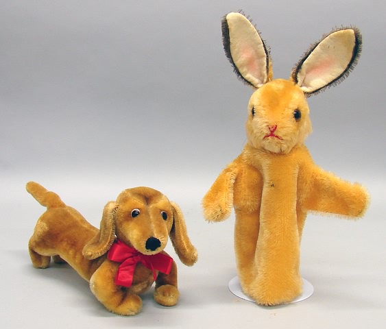 Appraisal: Pair of mohair animals Orange rabbit hand puppet with brown