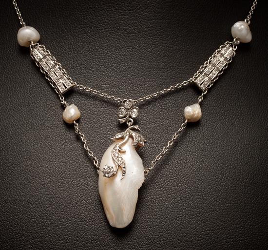 Appraisal: Edwardian unmarked white and yellow gold diamond and baroque pearl