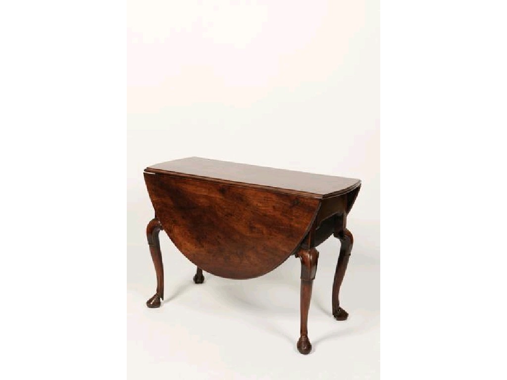 Appraisal: A GEORGE II MAHOGANY DROP FLAP DINING TABLE the oval