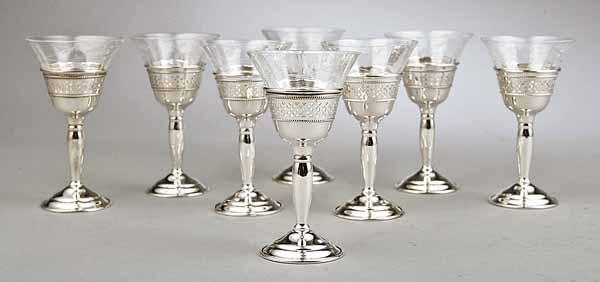 Appraisal: A Set of Eight Cartier Sterling Silver and Crystal Cordials