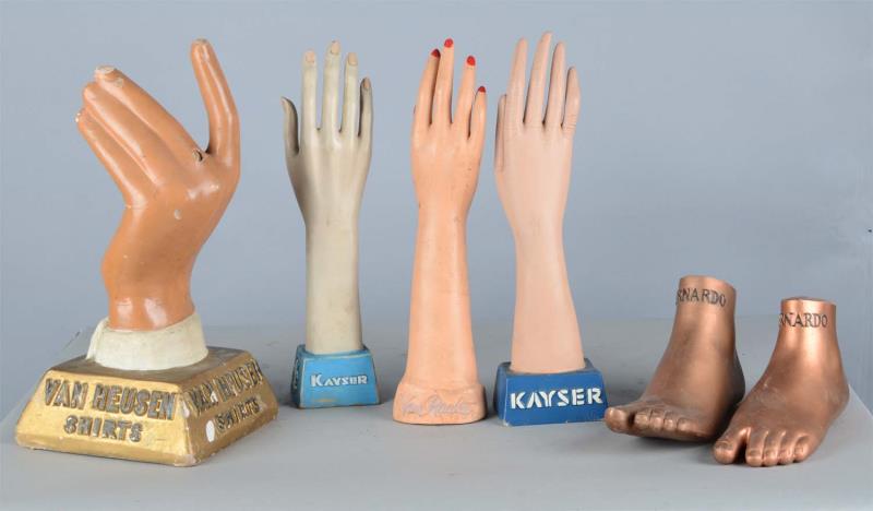 Appraisal: Lot Of Figural Hand Foot Advertising Displays This lot includes