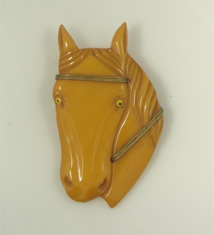 Appraisal: Bakelite horse head pin butterscotch color brass colored bridle x