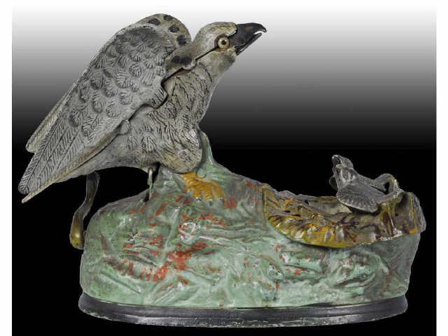 Appraisal: Cast Iron Eagle Eaglets Mechanical Bank Description Manufactured by J