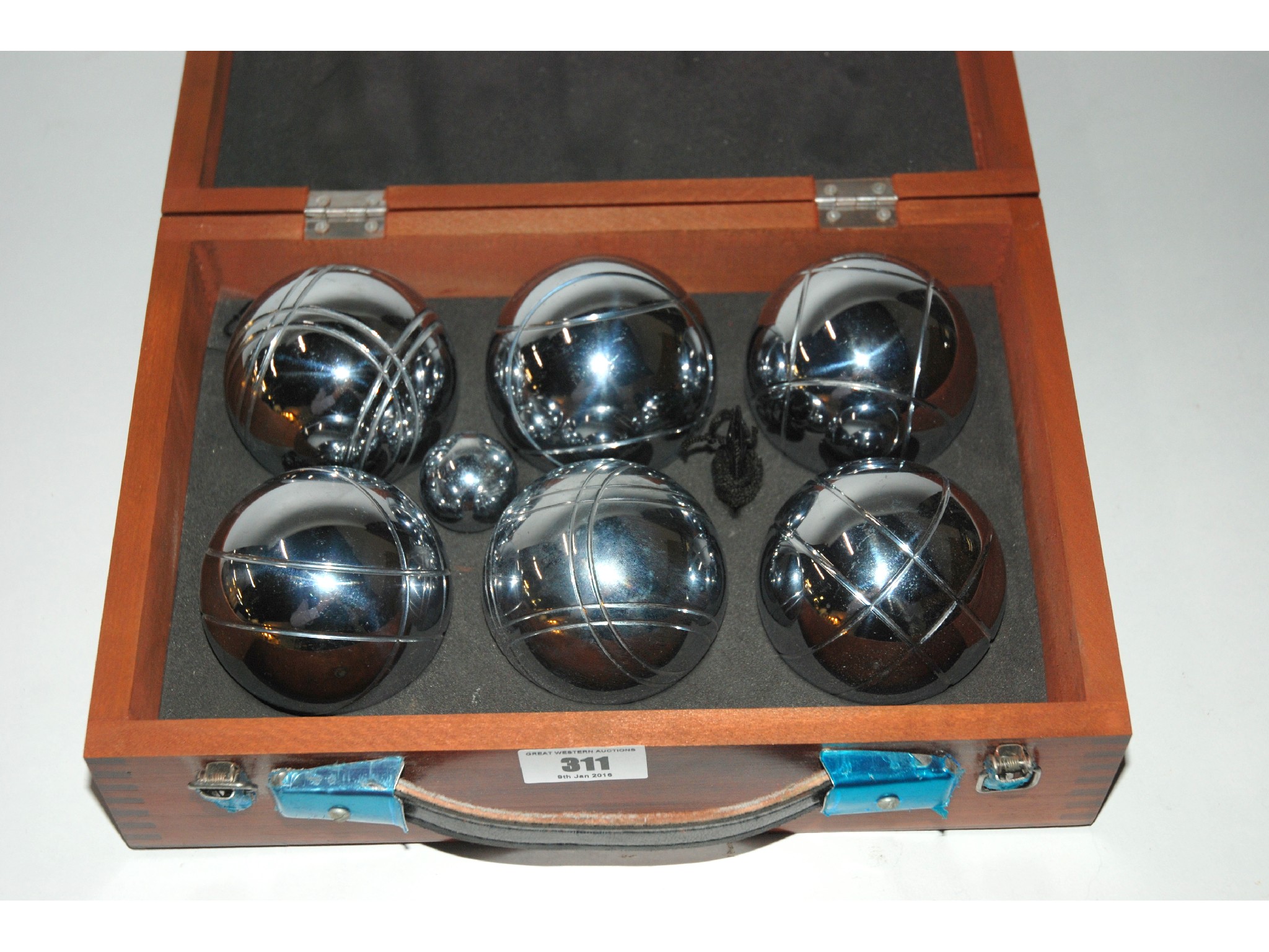 Appraisal: A set of white metal boules in fitted caseall proceeds