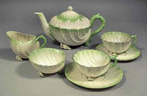 Appraisal: A Belleek porcelain tea service of ''Neptune'' design partially painted