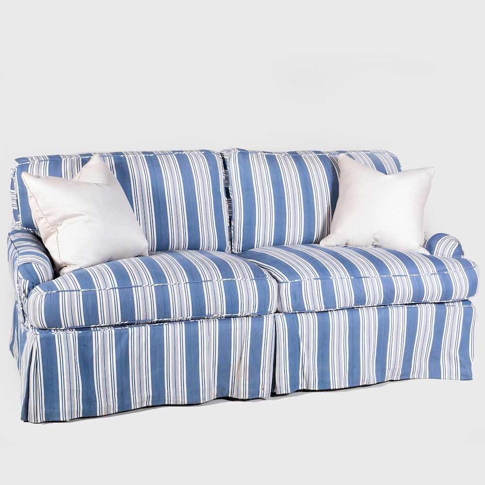 Appraisal: Blue and White Striped Cotton Upholstered Sofa With two pillows