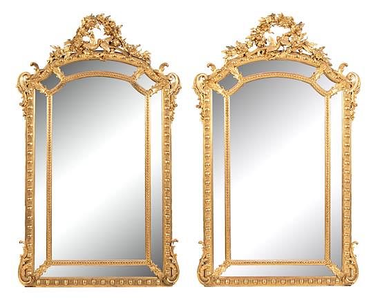 Appraisal: A Pair of Louis XV Style Carved Mirrors Height x