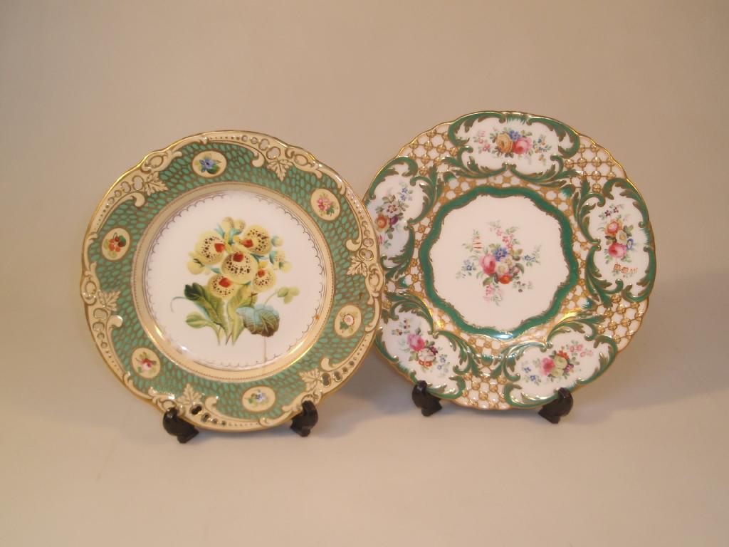 Appraisal: A thC English porcelain cabinet plate painted with floral sprays